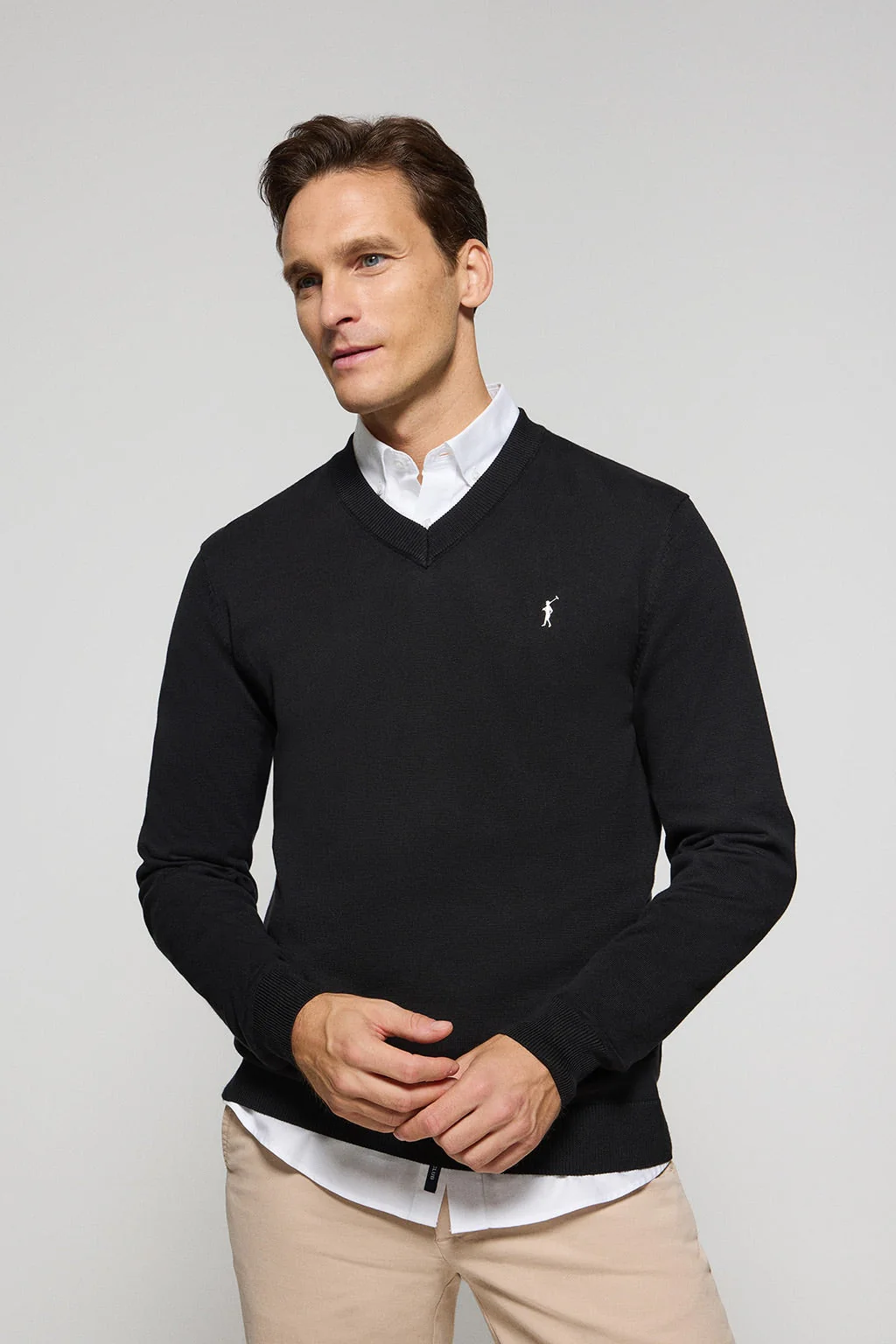 Black V-neck knit jumper with Rigby Go embroidery