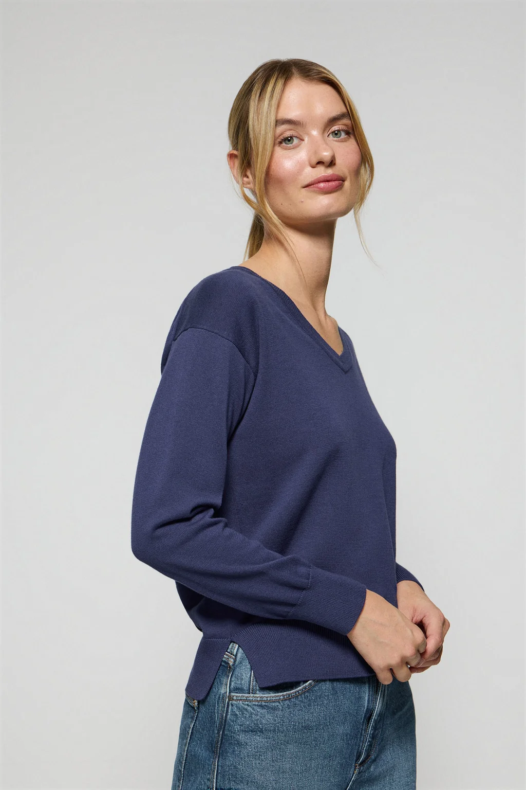 Ocean-blue V-neck knit jumper with Rigby Go embroidered logo - Image 5