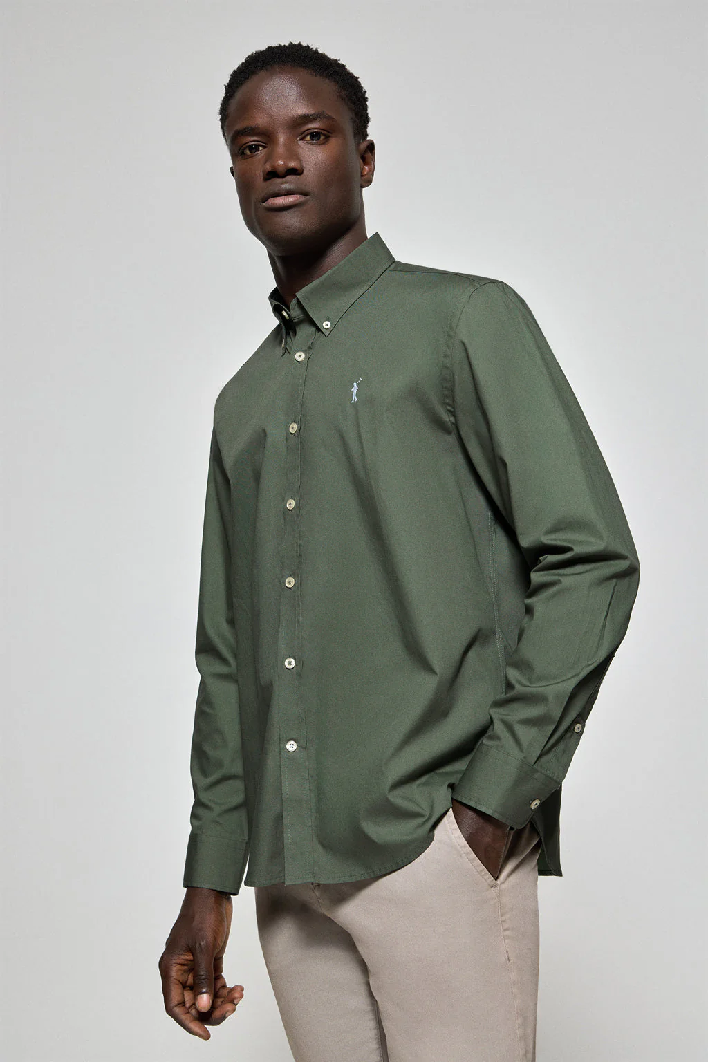 Green poplin shirt with Rigby Go embroidered logo