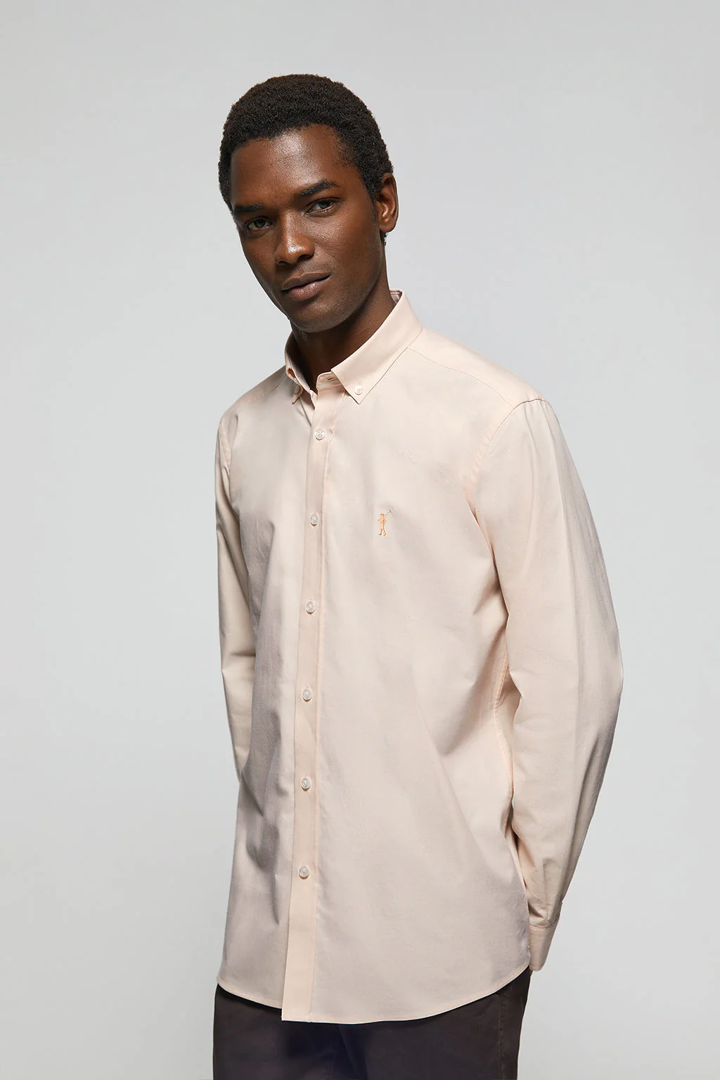 Peach Oxford shirt with Rigby Go logo