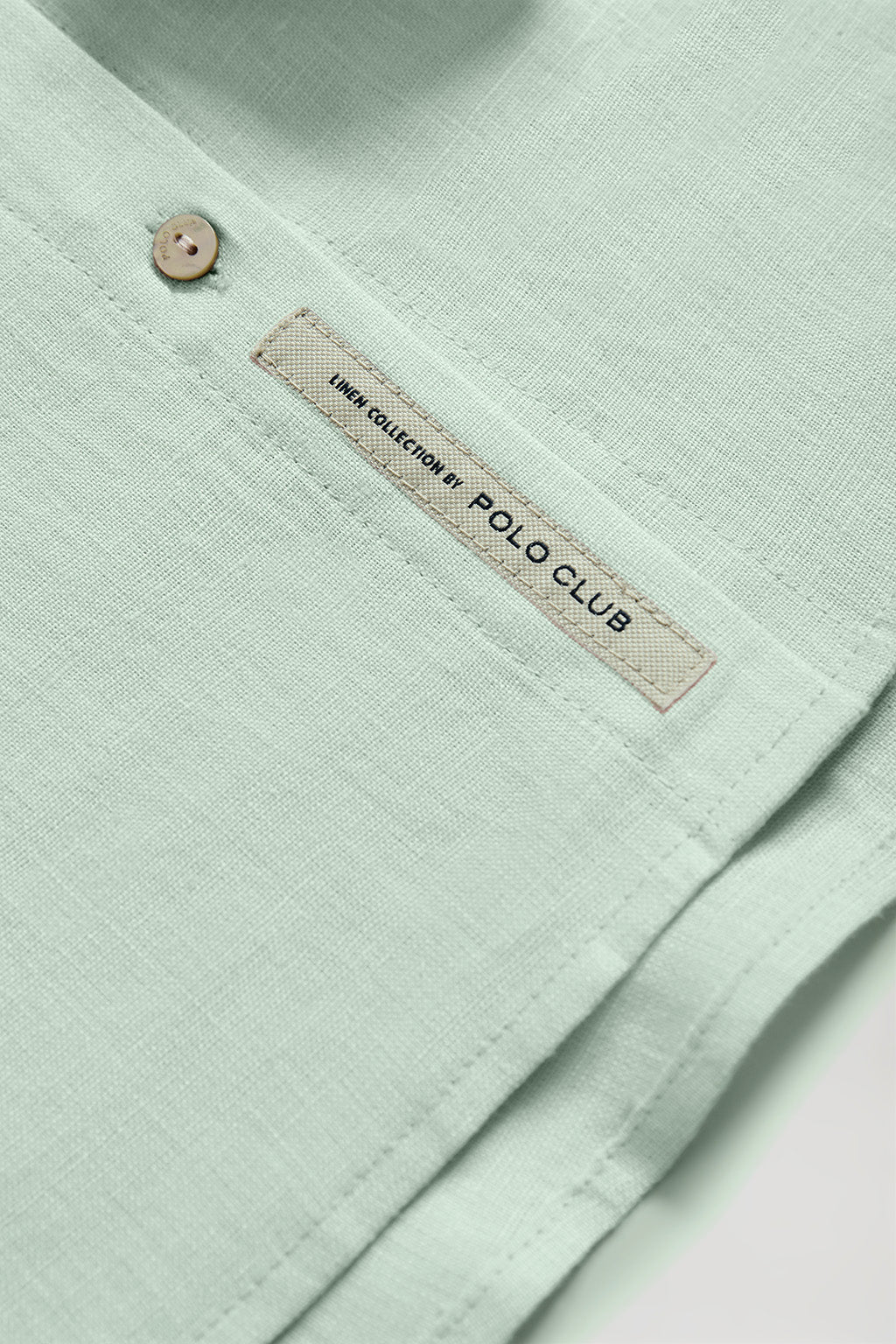 Dusty-green linen shirt with Rigby Go embroidered detail - Image 9
