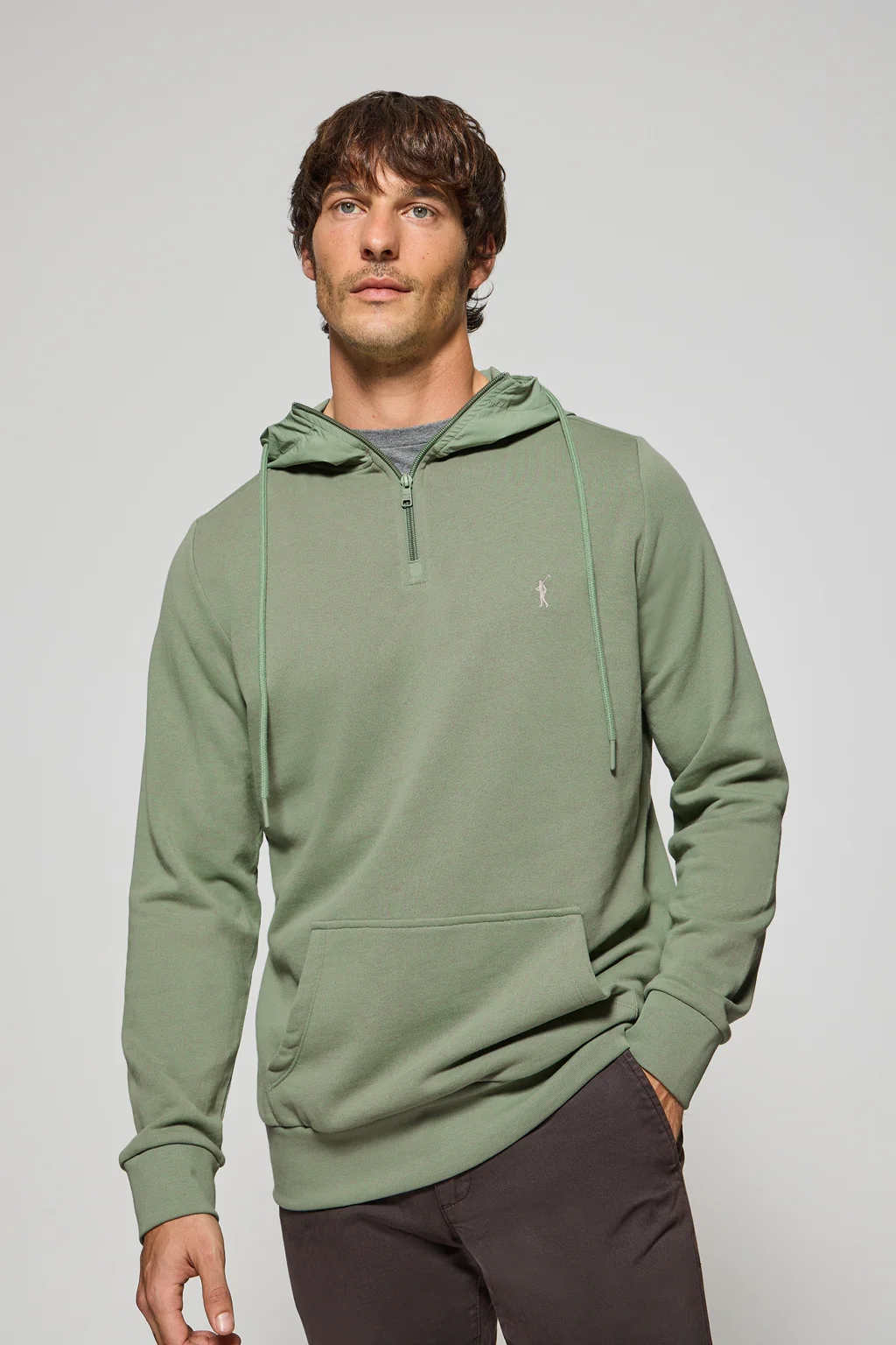 Jade-green half-zip hoodie with Rigby Go logo