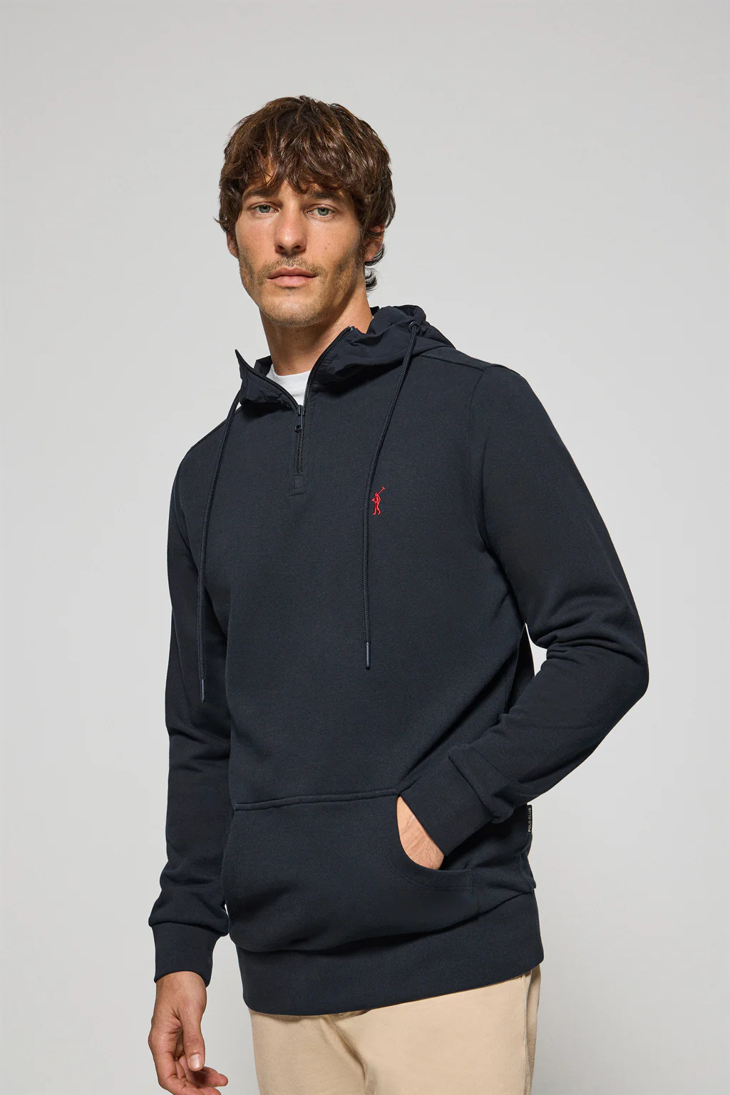 Navy-blue half-zip hoodie with Rigby Go logo