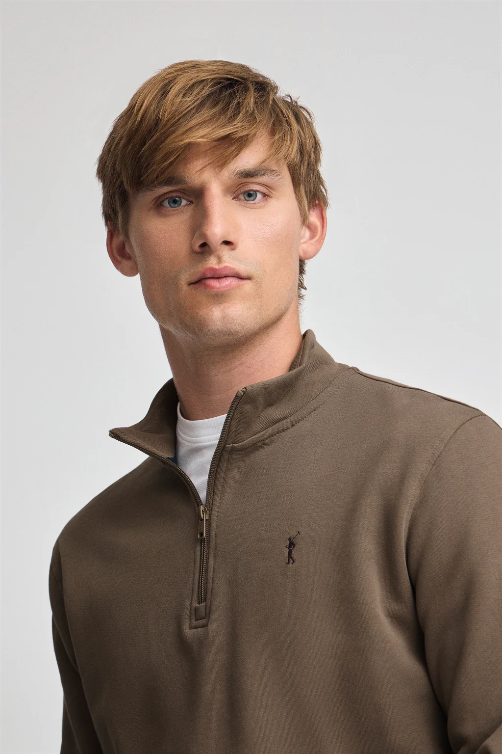 Brown half-zip sweatshirt with Rigby Go logo
