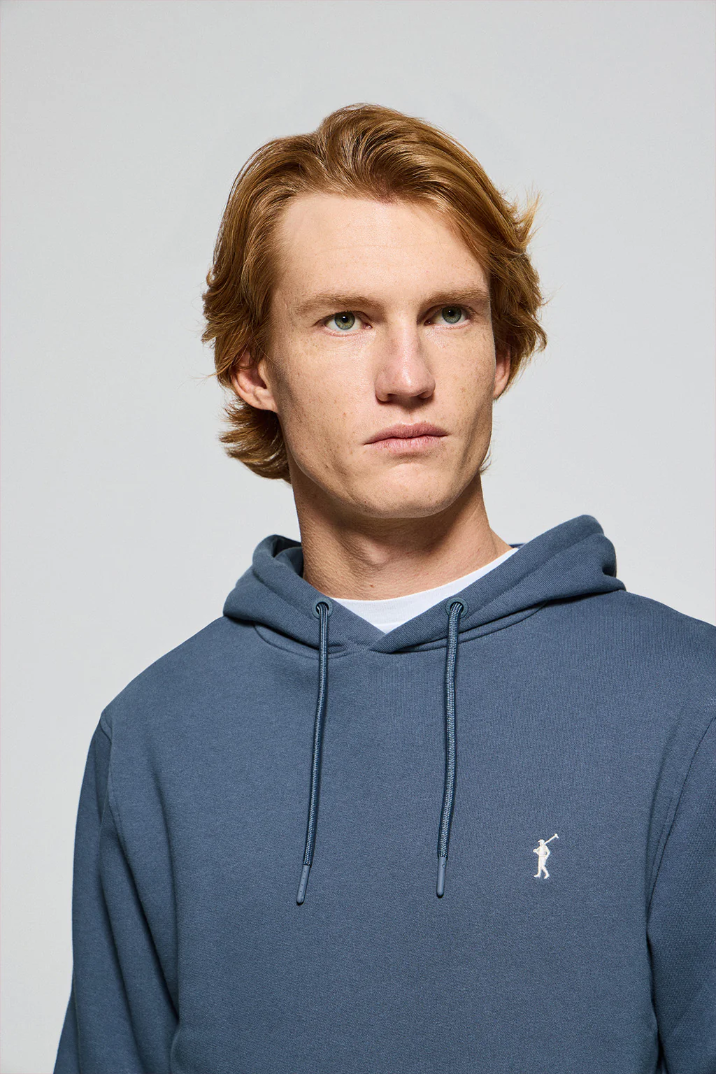 Denim-blue hoodie with pockets and Rigby Go embroidered logo - Image 3