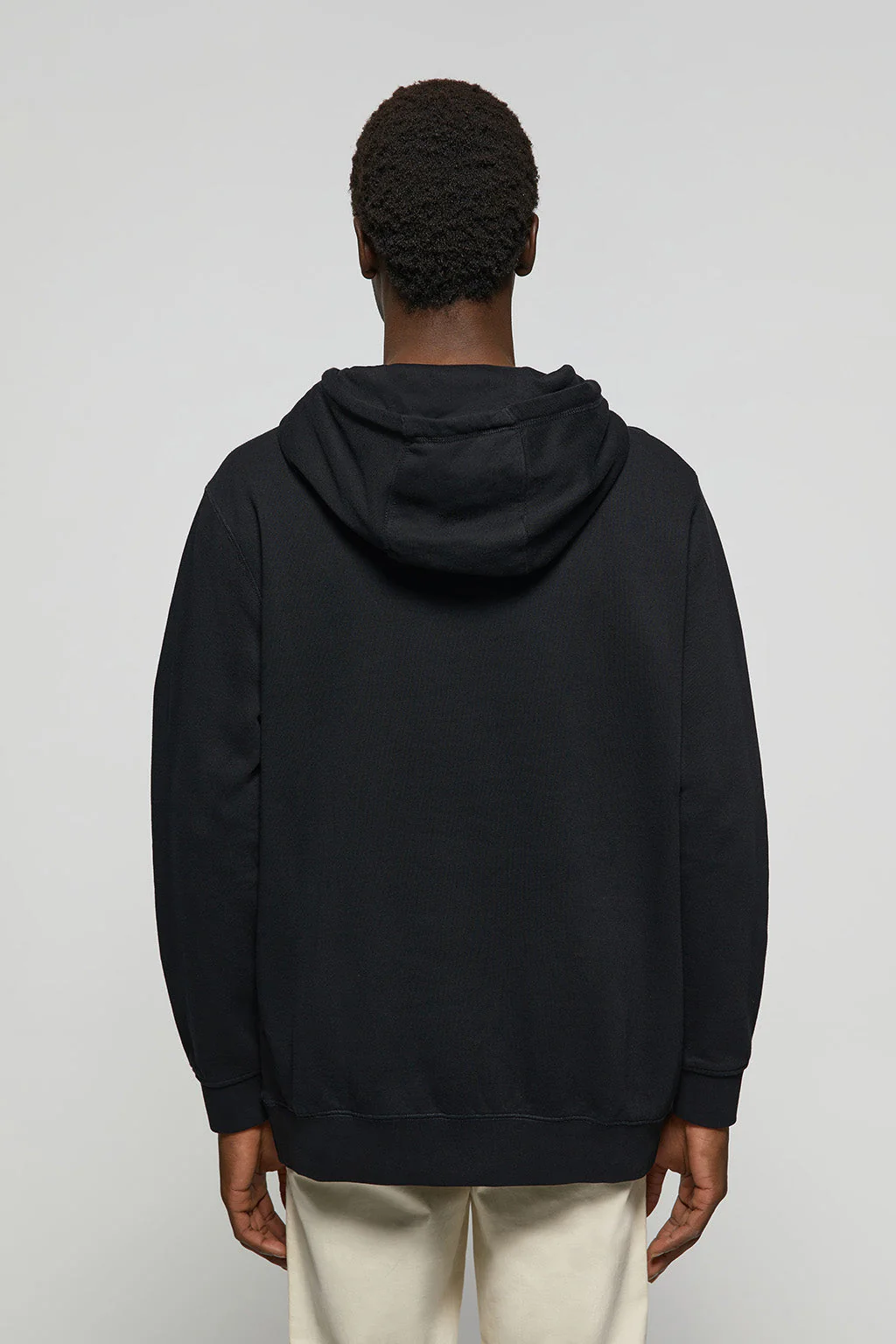 Black hoodie with pockets and Rigby Go logo - Image 4
