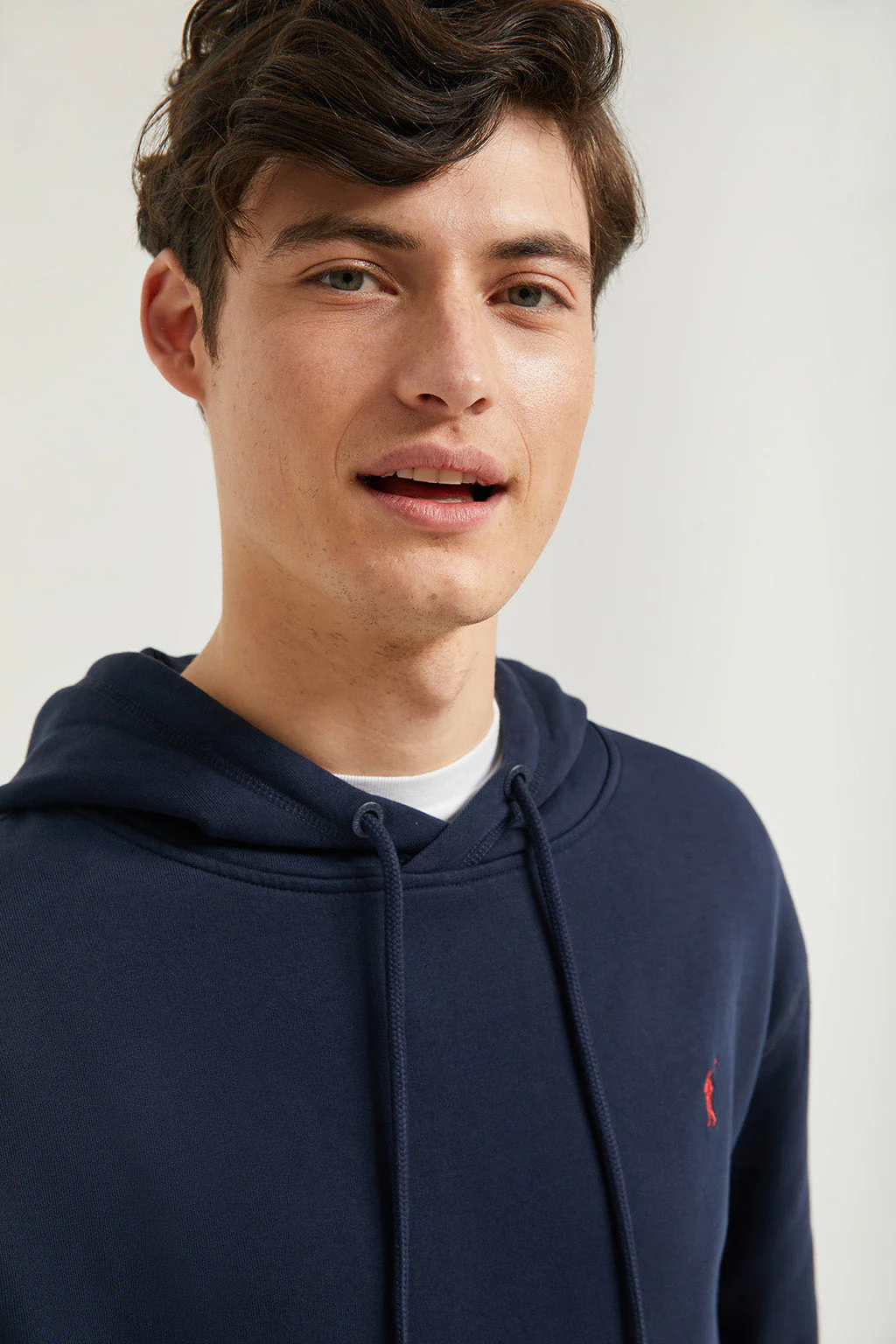 Navy-blue hoodie with pockets and Rigby Go logo