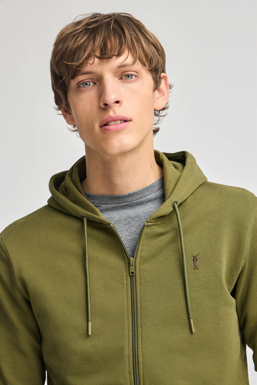 Green zipped hoodie with Rigby Go logo - Image 3
