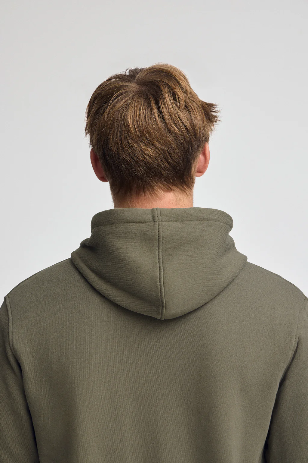 Army-green zip-up hoodie with Rigby Go logo - Image 4