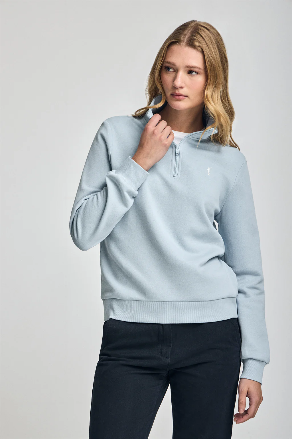 Light-blue half-zip sweatshirt with Rigby Go embroidery