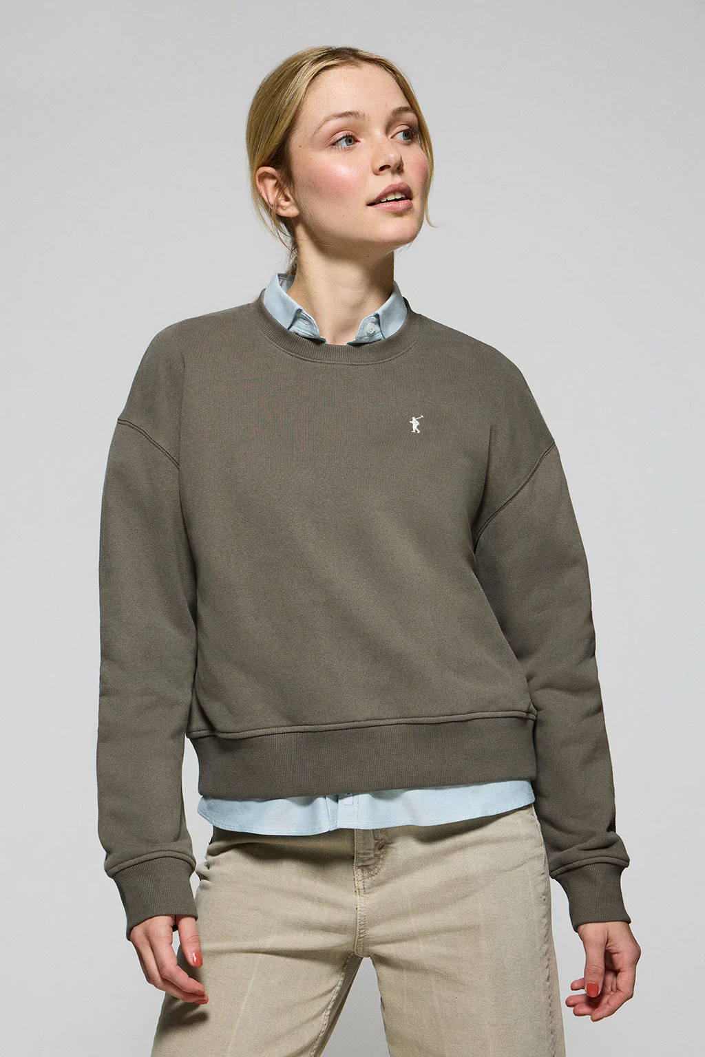 Green round-neck sweatshirt with Rigby Go embroidered logo