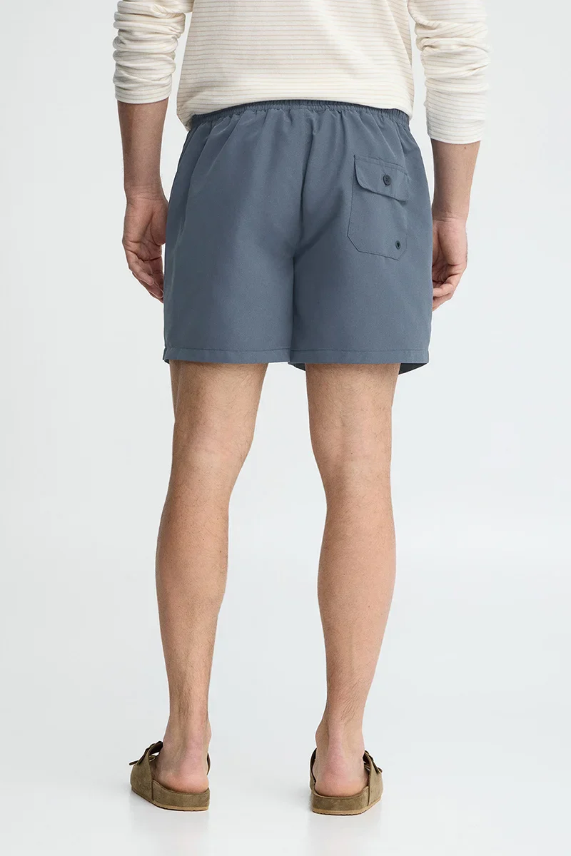 Denim-blue short swim shorts with Rigby Go logo - Image 5