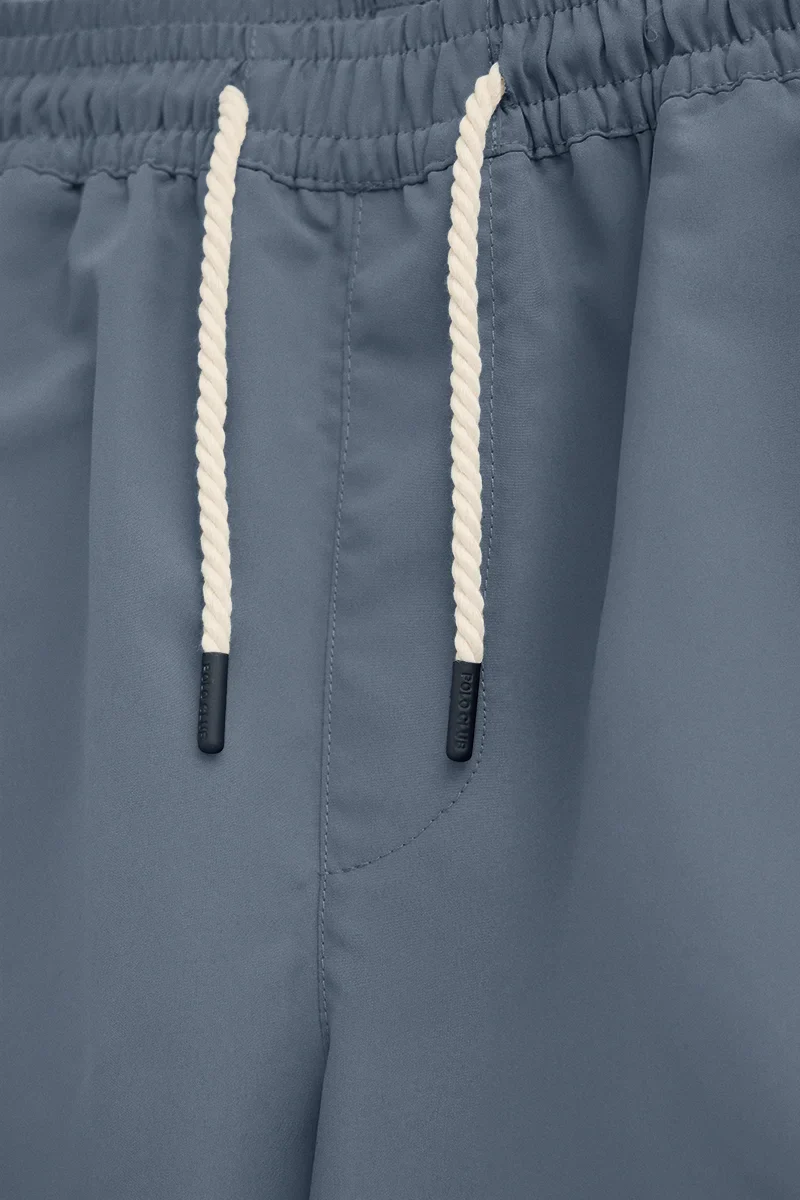 Denim-blue short swim shorts with Rigby Go logo - Image 8