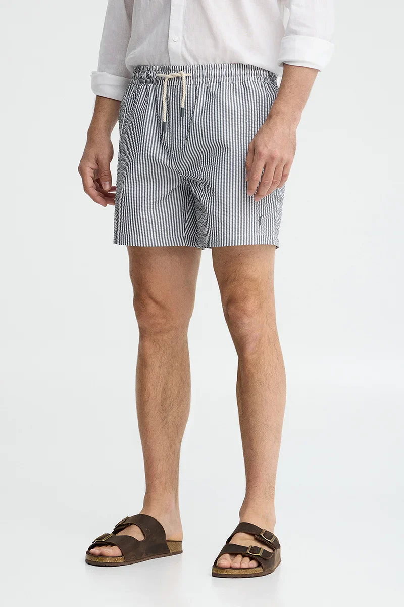 Short swim shorts in grey and white with crinkled texture and Rigby Go logo - Image 4