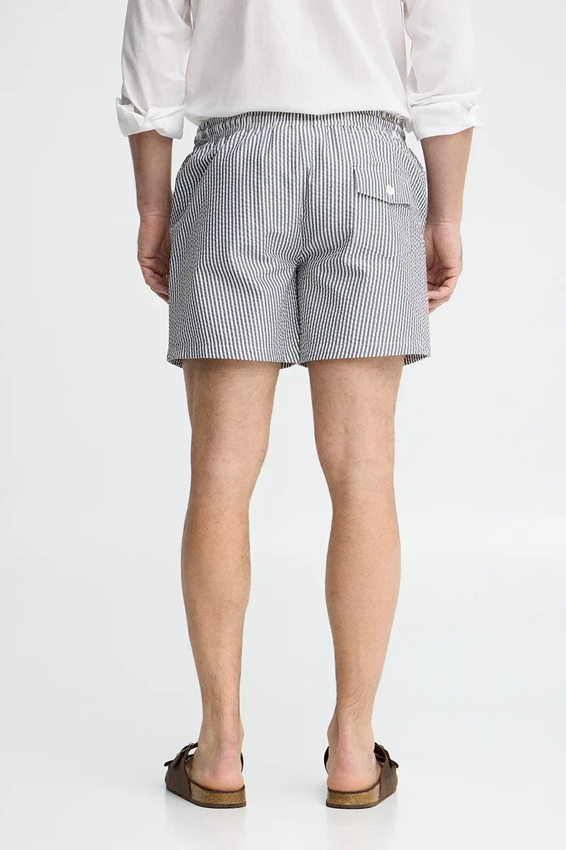 Short swim shorts in grey and white with crinkled texture and Rigby Go logo - Image 5