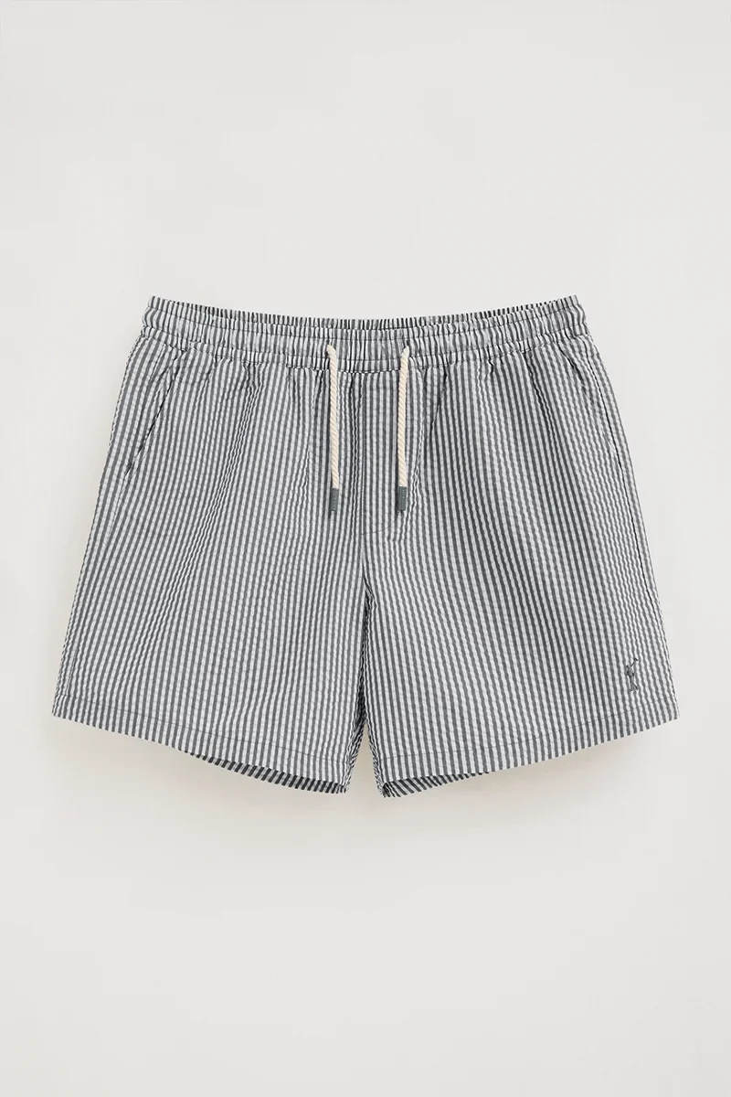 Short swim shorts in grey and white with crinkled texture and Rigby Go logo - Image 6