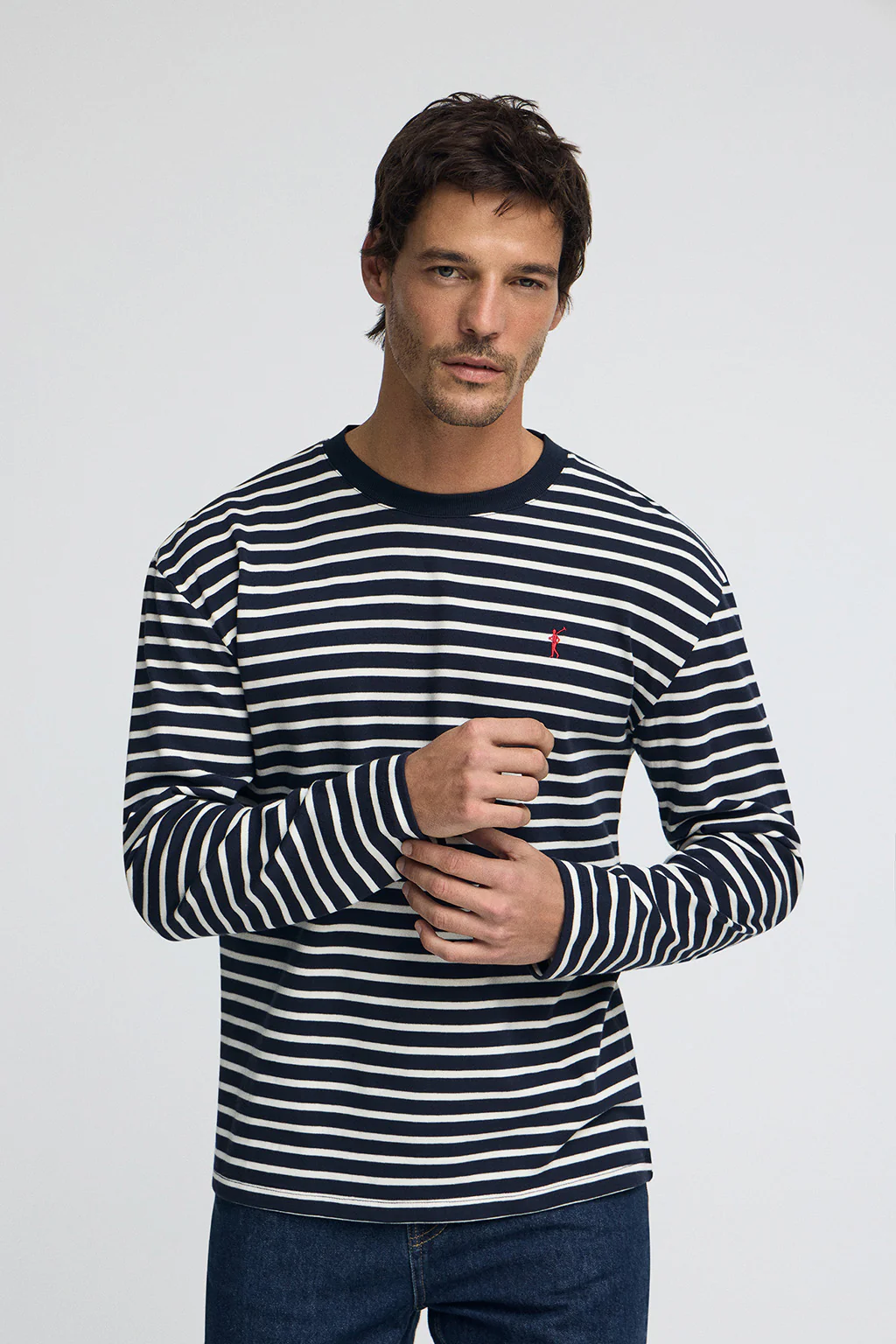 Striped T-shirt in navy blue and nude with Rigby Go embroidered logo