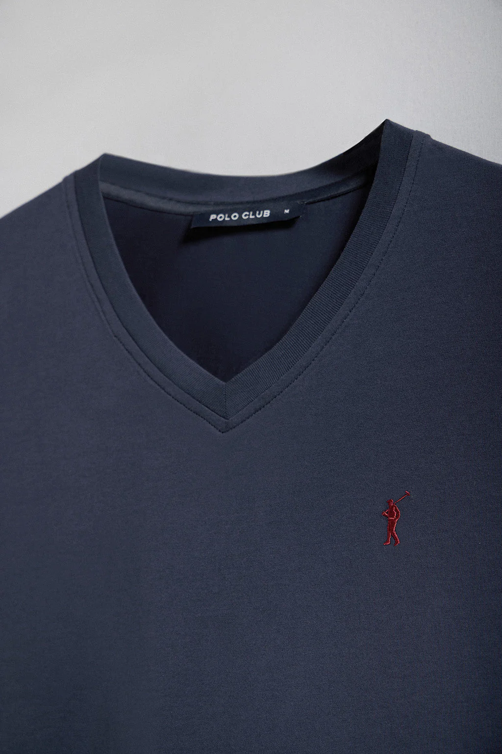 Navy V-neck short-sleeve tee with Rigby Go embroidery - Image 6