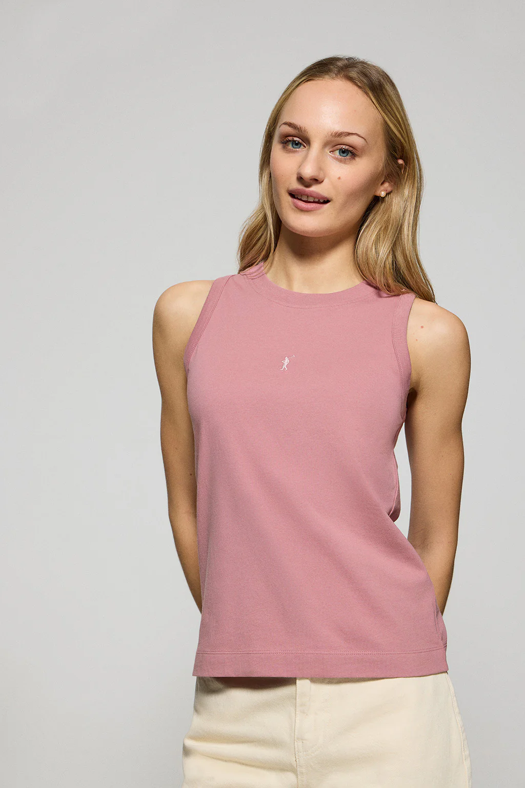 Dusty-pink sleeveless basic tee with round neck and Rigby Go embroidered logo