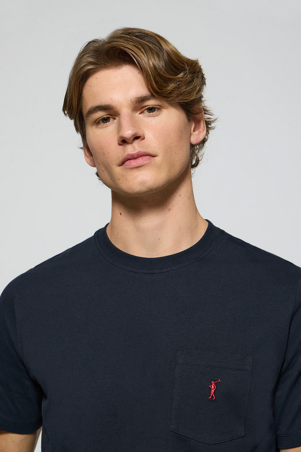 Navy-blue round-neck tee with pocket and Rigby Go logo - Image 2