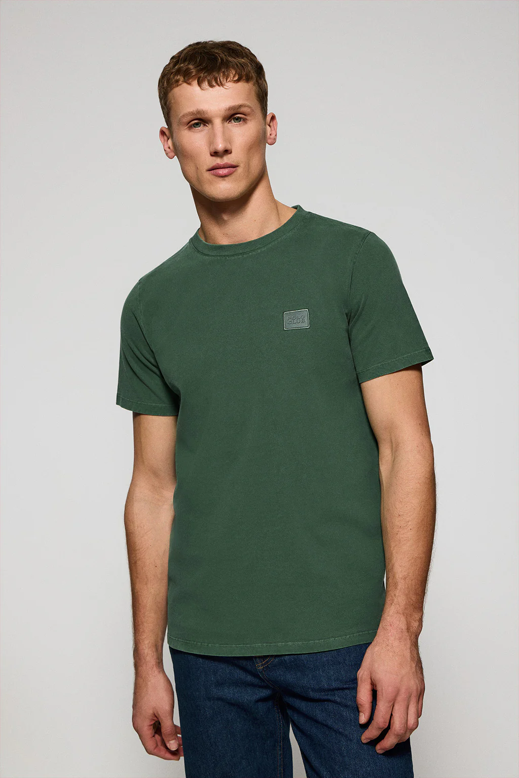 Green garment-dyed tee with round neck and Polo Club rubber logo