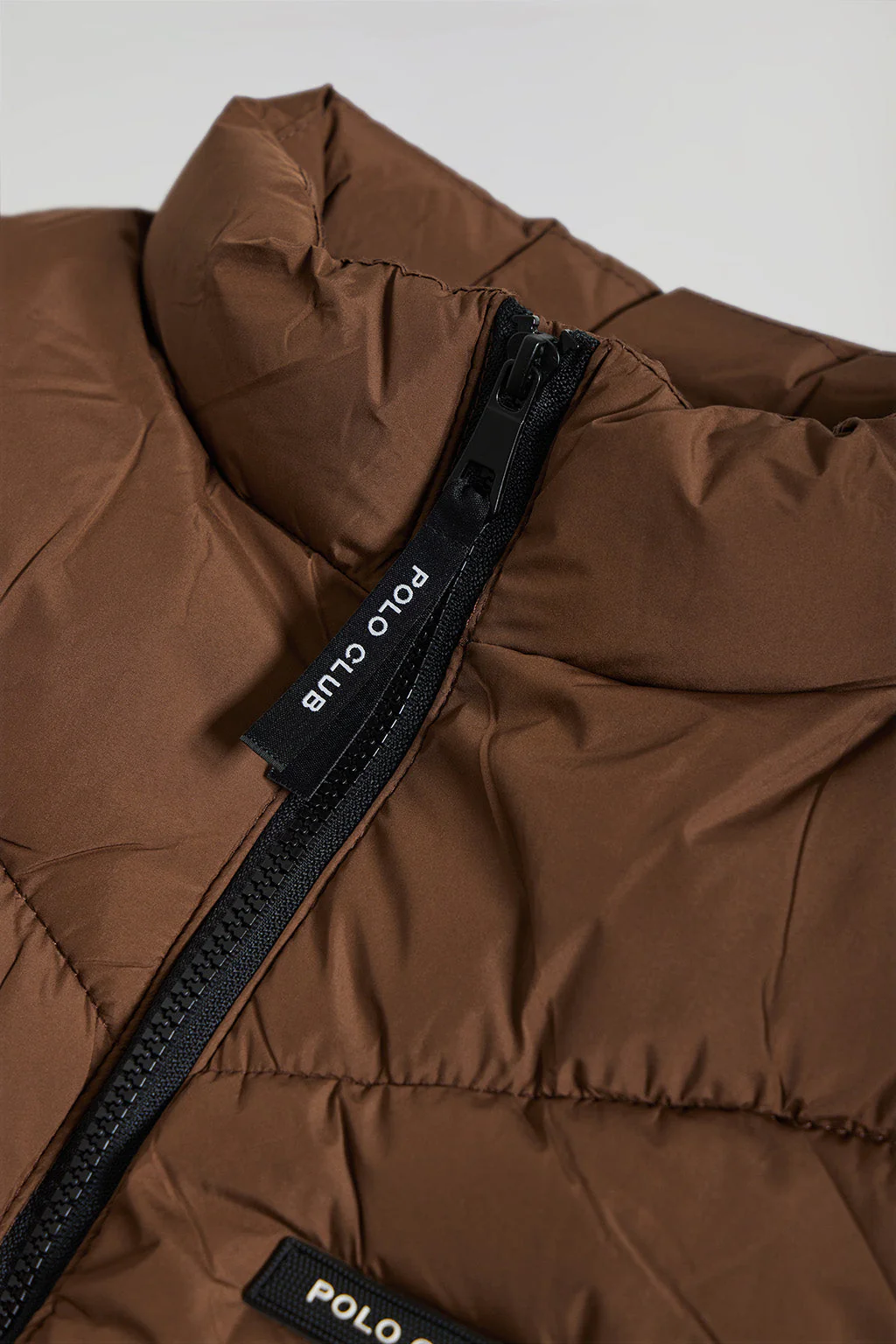 Brown puffer vest with branded details - Image 6