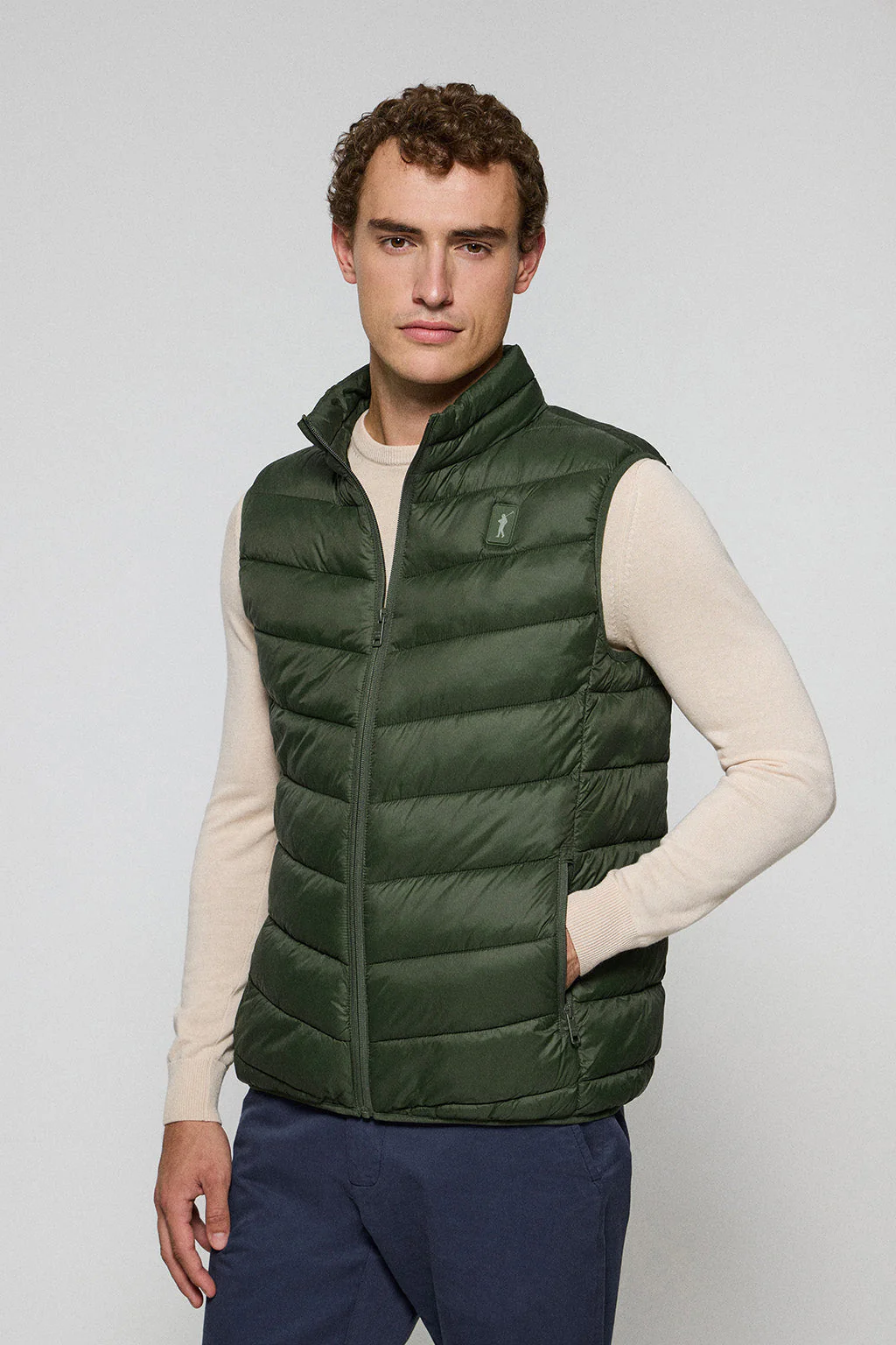 Dark-green ultralight vest Chase with Rigby Go patch