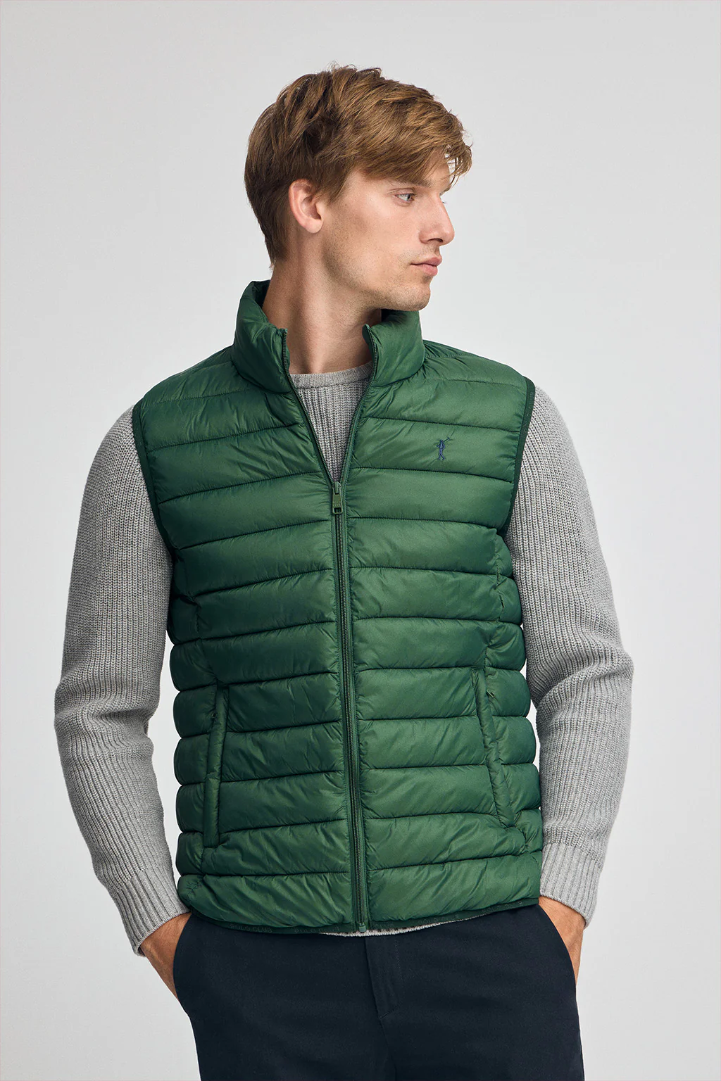 Bottle-green ultralight vest with Rigby Go logo