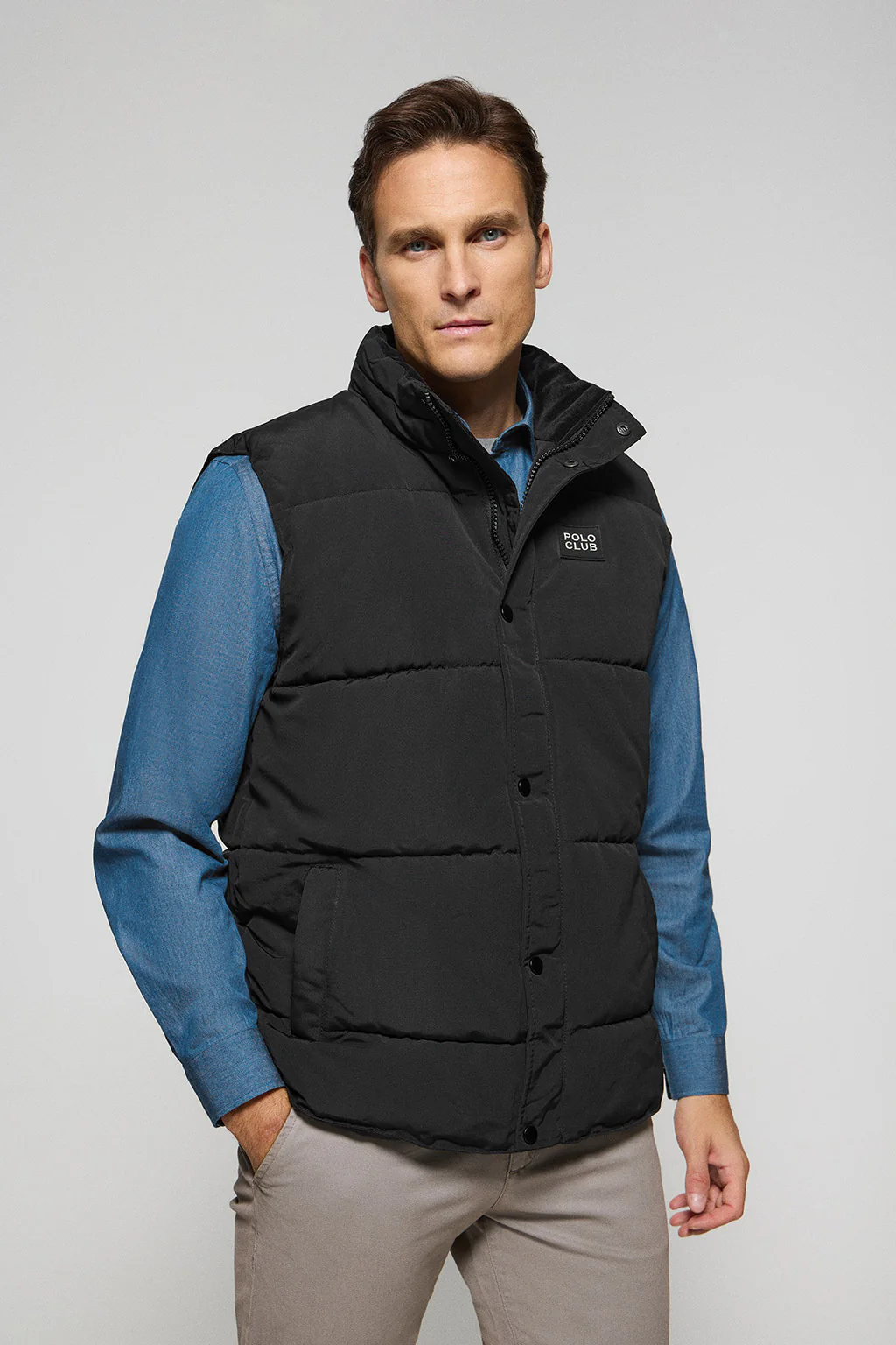 Black puffer vest with Polo Club rubber patch