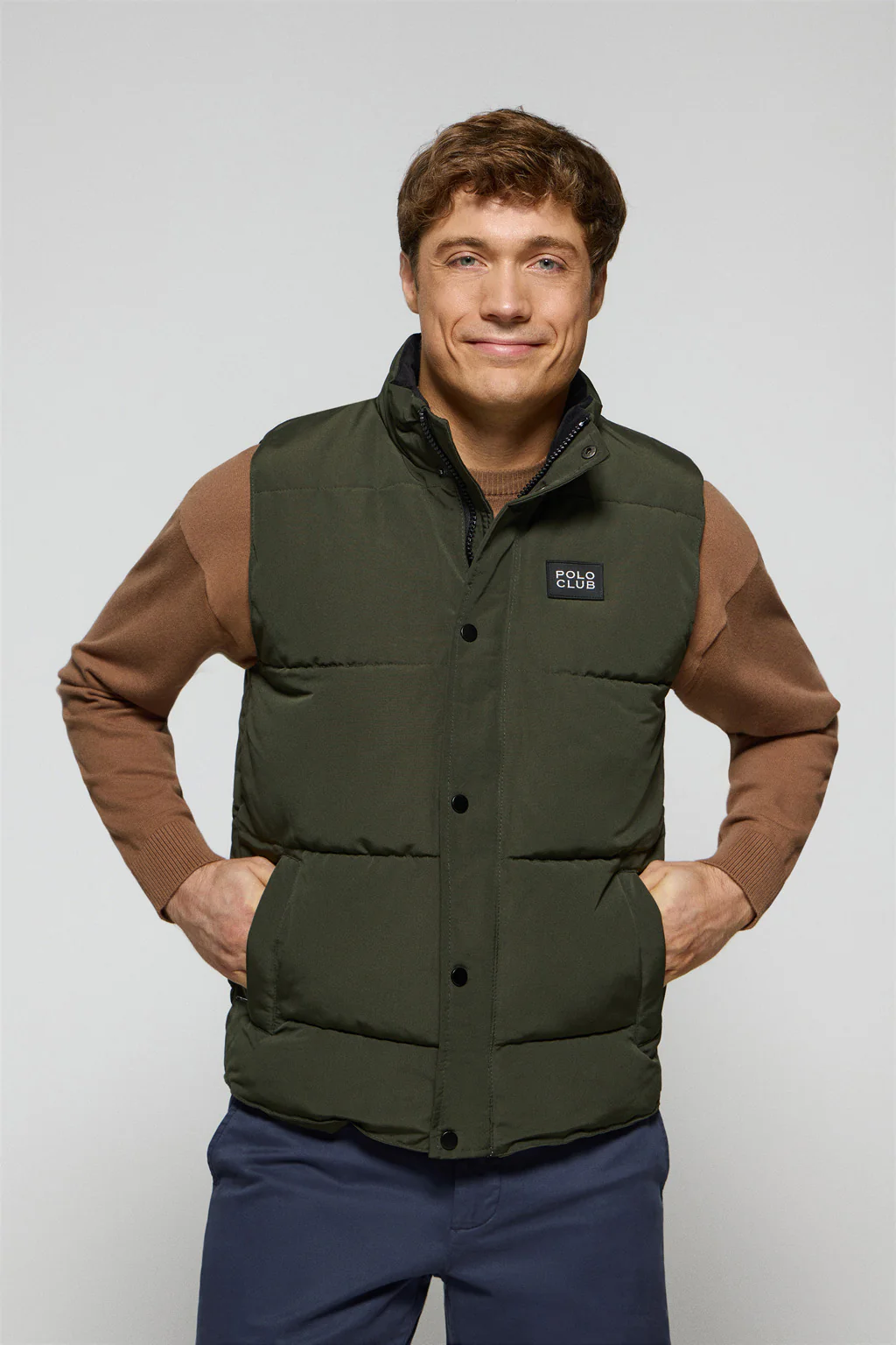 Green puffer vest with Polo Club rubber patch